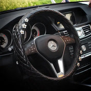 Housse De Volant Noir En Cuir Avec Motif Marguerite - ConfortVoiture.fr