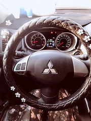 Housse De Volant Noir En Cuir Avec Motif Marguerite - ConfortVoiture.fr