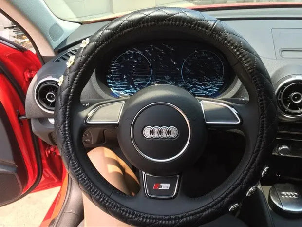 Housse De Volant Noir En Cuir Avec Motif Marguerite - ConfortVoiture.fr