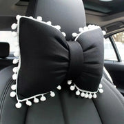 Coussin Appui-Tête Noeud Noir Pour Voiture Avec Pompon - ConfortVoiture.fr